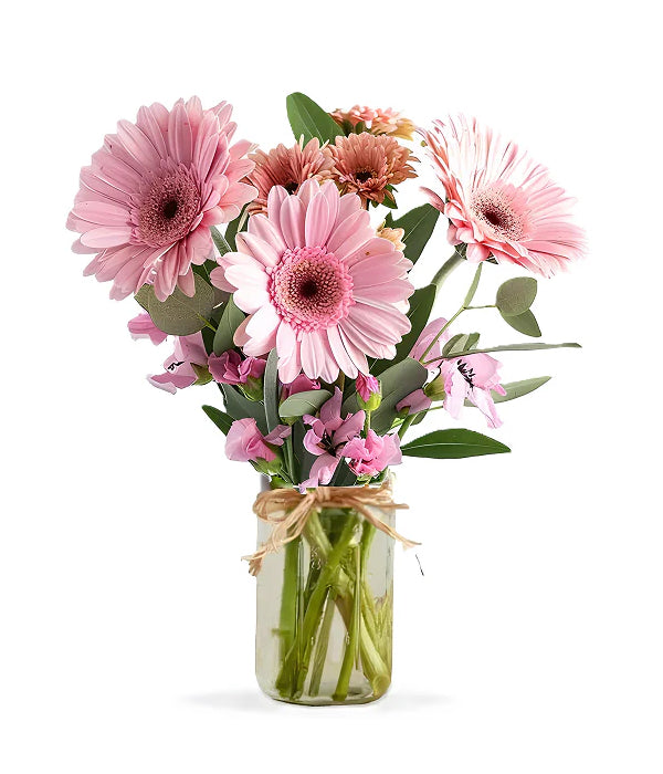 Pink flowers in mason jar