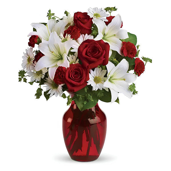 red and white flowers in a vase